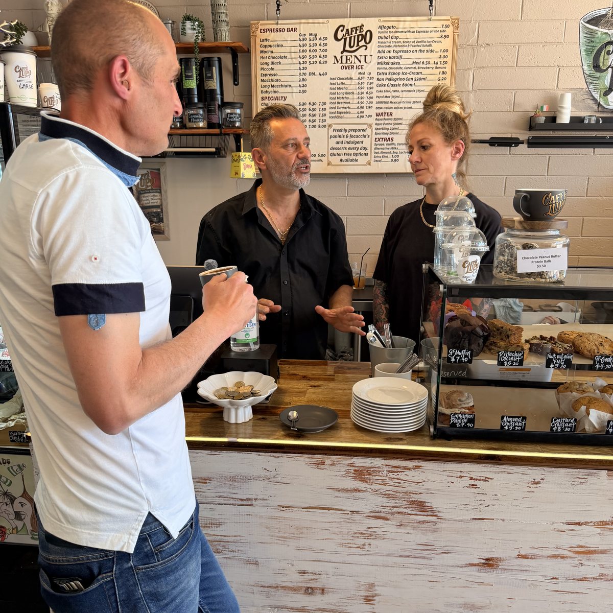 Peter talking with Alex and Alison at Caffè Lupo